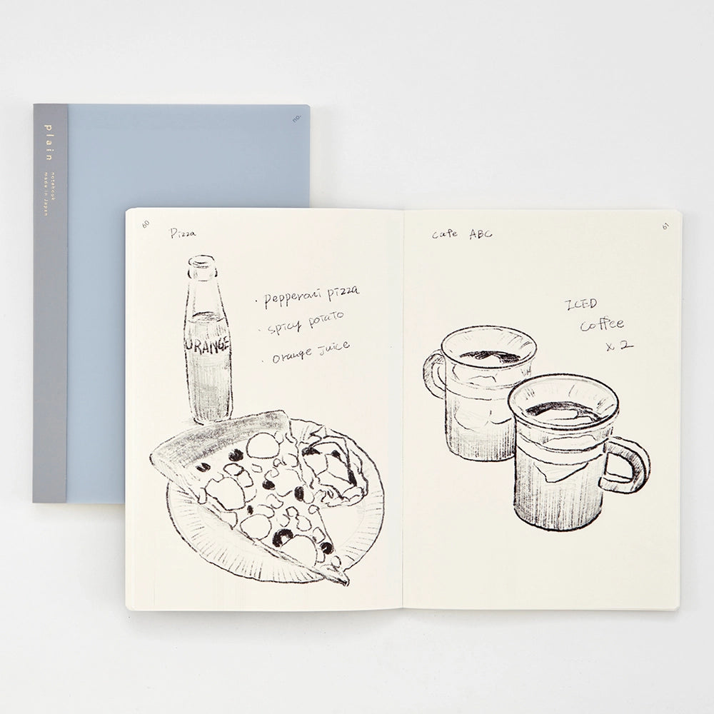 Notebook with illustrations of pizza and coffee on a white background