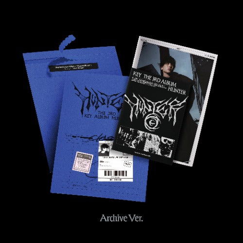 Blue album cover with black text and a photo of a person wearing a black shirt with white text on a black background.