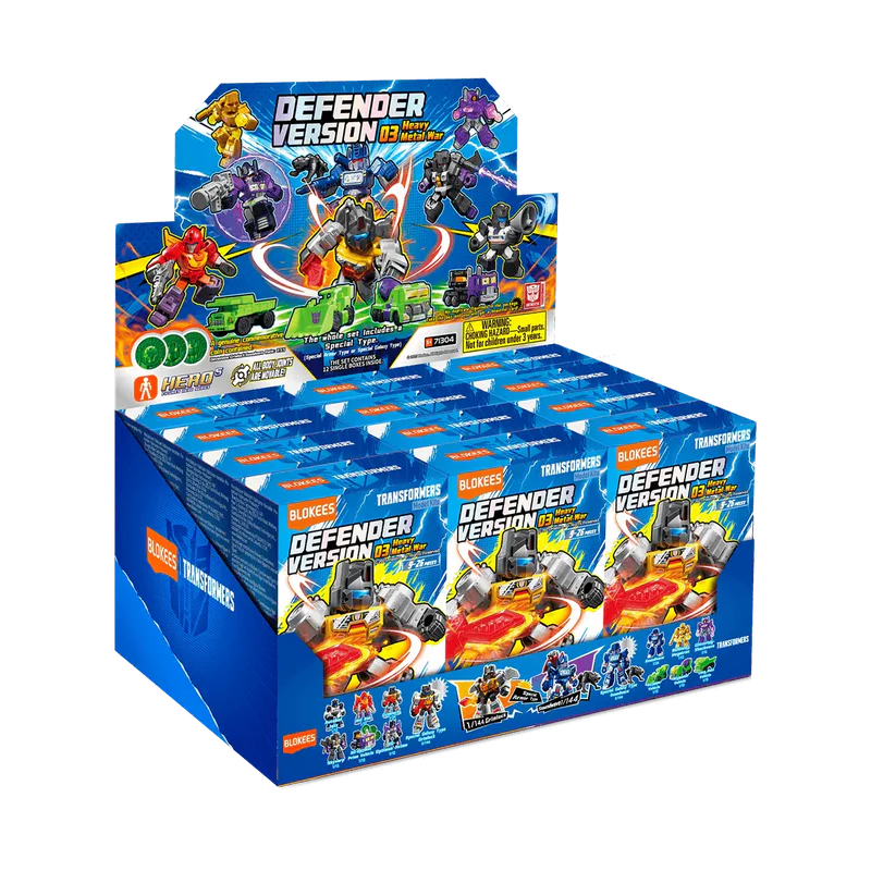 Display of Transformers toy boxes with 'Defender Version' packaging on a white background