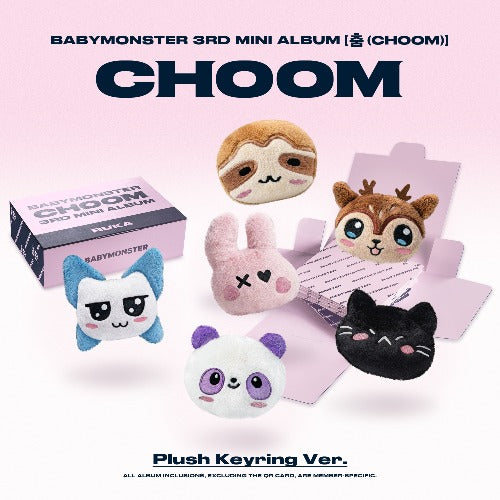 Promotional image for BABYMONSTER’s 3rd mini album “CHOOM,” featuring several small plush keychain characters (including a cat, bunny, panda, sloth, and deer) displayed in front of an open pastel-colored album box. The title “CHOOM” appears in large bold letters at the top, with “Plush Keyring Ver.” written at the bottom.