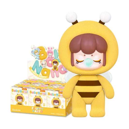 Toy figure in a yellow bee costume with a white background