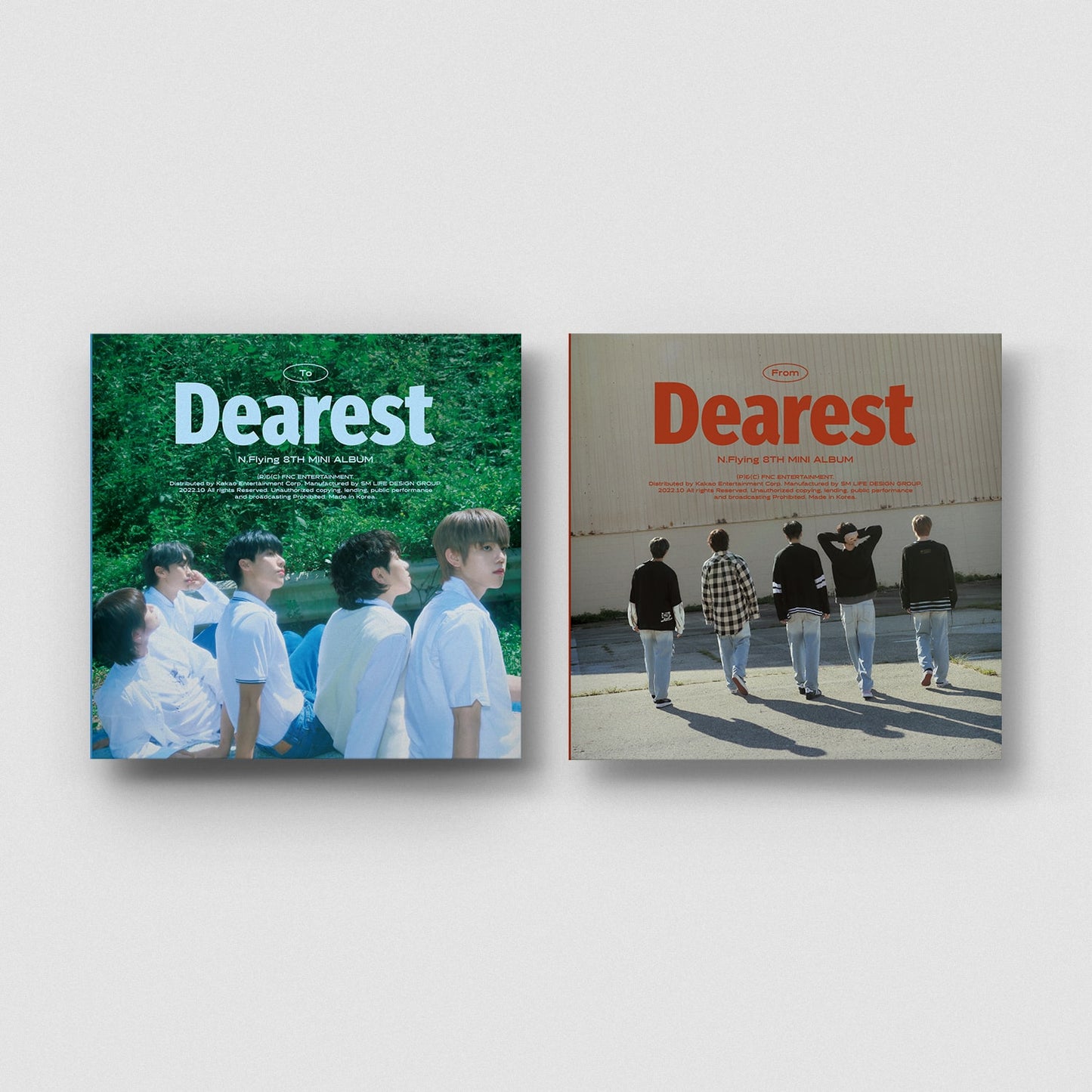 Two albums of N.Flying with group members and text ' Dearest' on cover