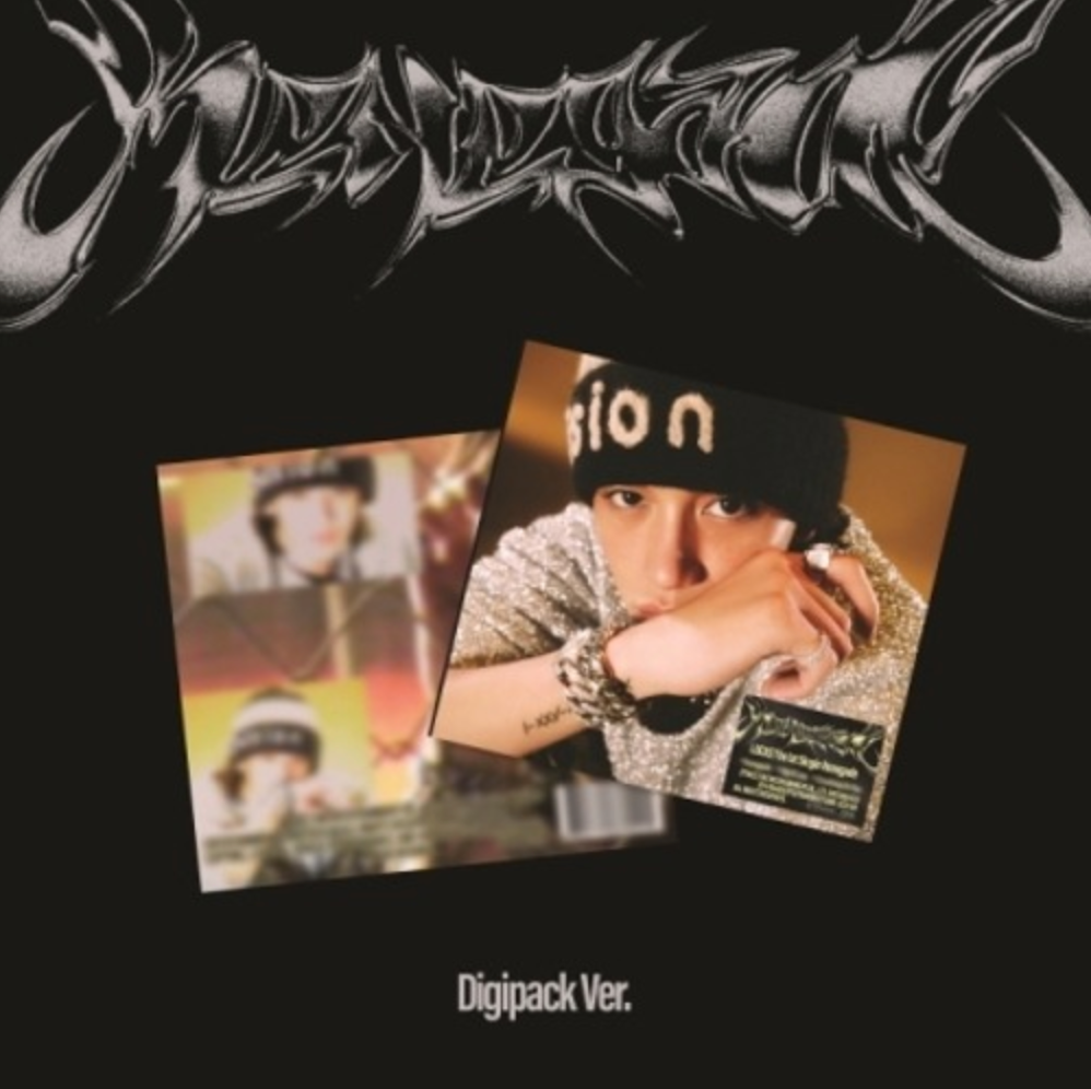 A digipack version of a music album cover featuring a black and white design with the artist's name and a photograph of the artist wearing a cap and a silver reflective jacket.