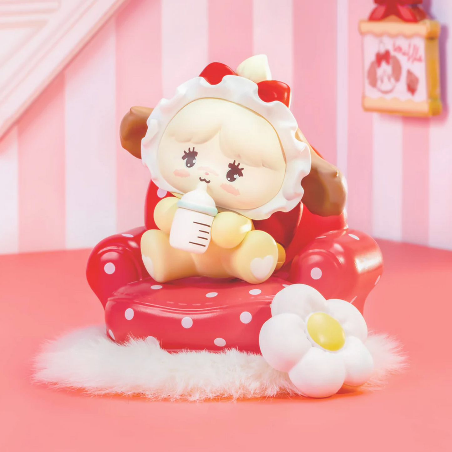Cute character plush toy sitting on a red polka dot chair in a pink room.