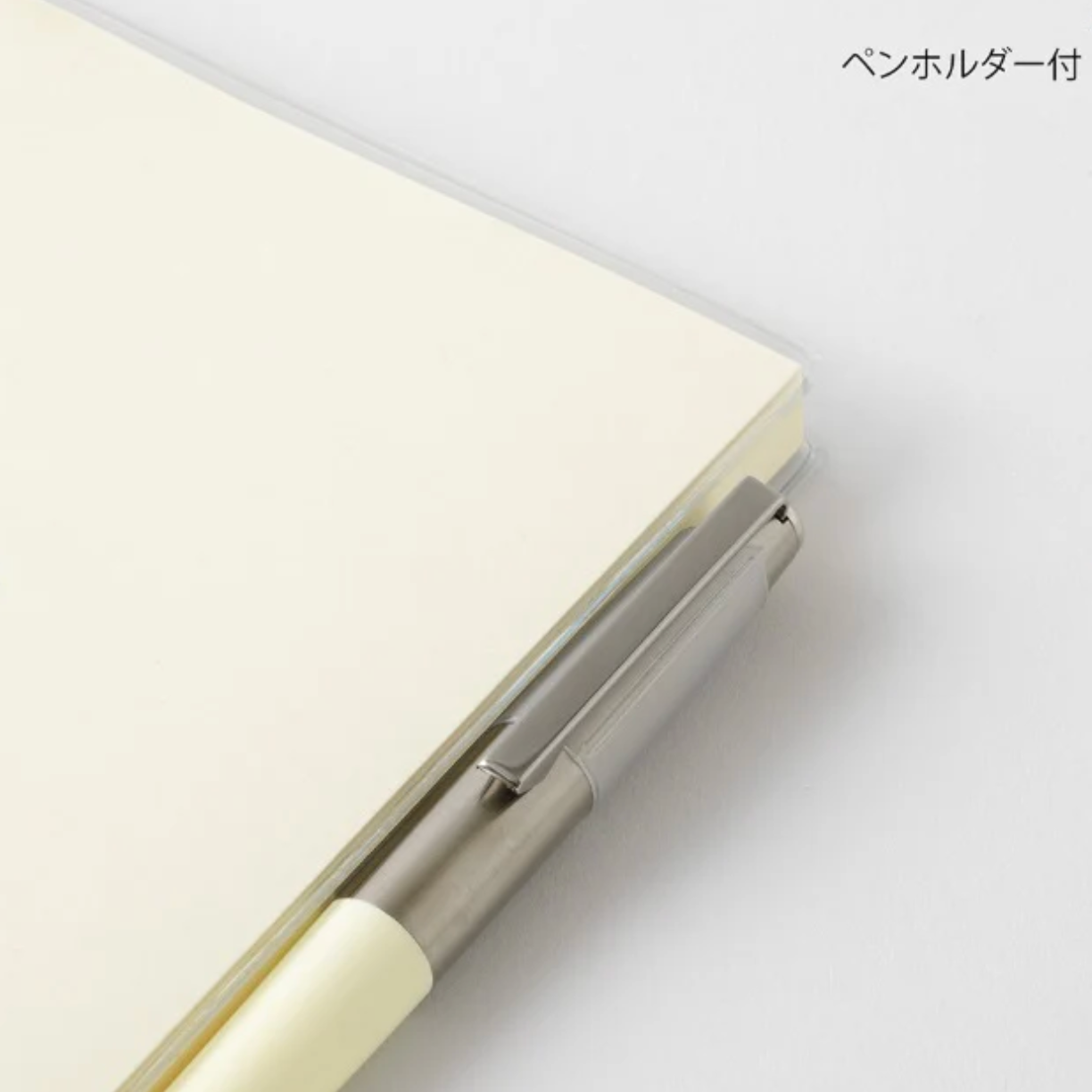 Notebook with a pen holder on a white background