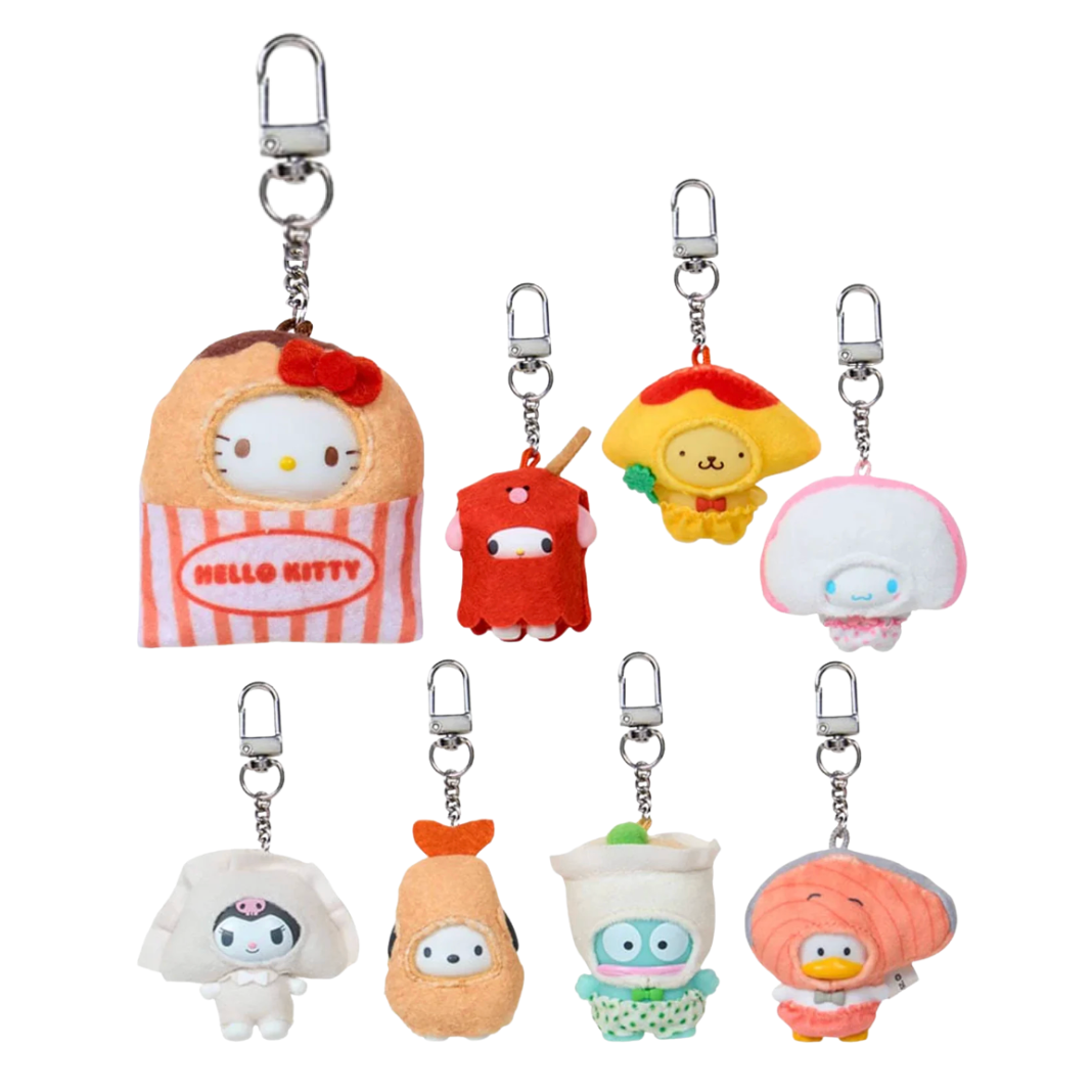 Set of cute Sanrio plush keychains on a white background
