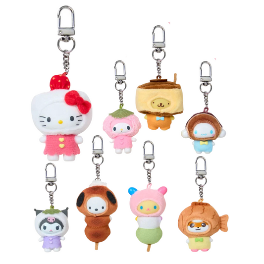 Set of cute Sanrio plush keychains on a white background