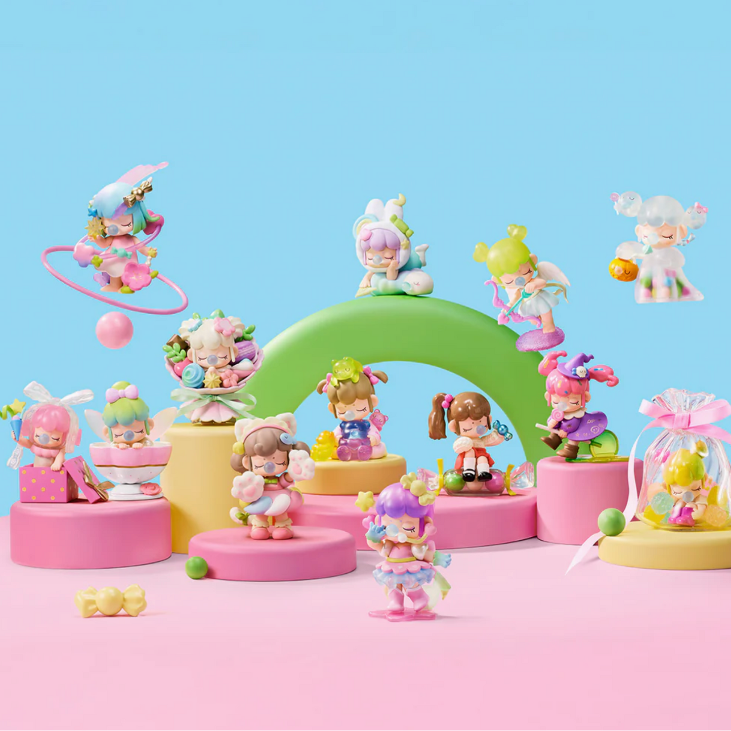 Colorful toy figures on a pink and blue background