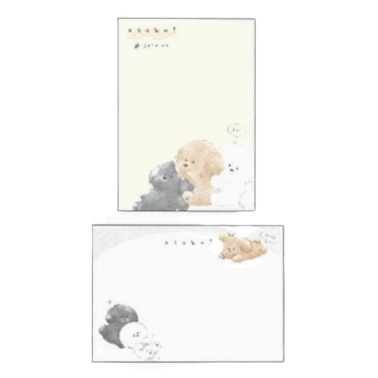 A set of stationery items featuring cute watercolor illustrations of a gray bear, a fluffy cream-colored bear, and a small bunny. The set includes a blank cream-colored card with a small printed header and a matching envelope with a larger printed illustration.