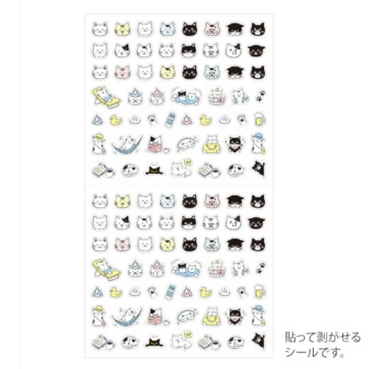 A sheet of small cartoon cat-themed stickers with many tiny illustrated faces and small motifs, shown on a white background with Japanese text at the bottom right.