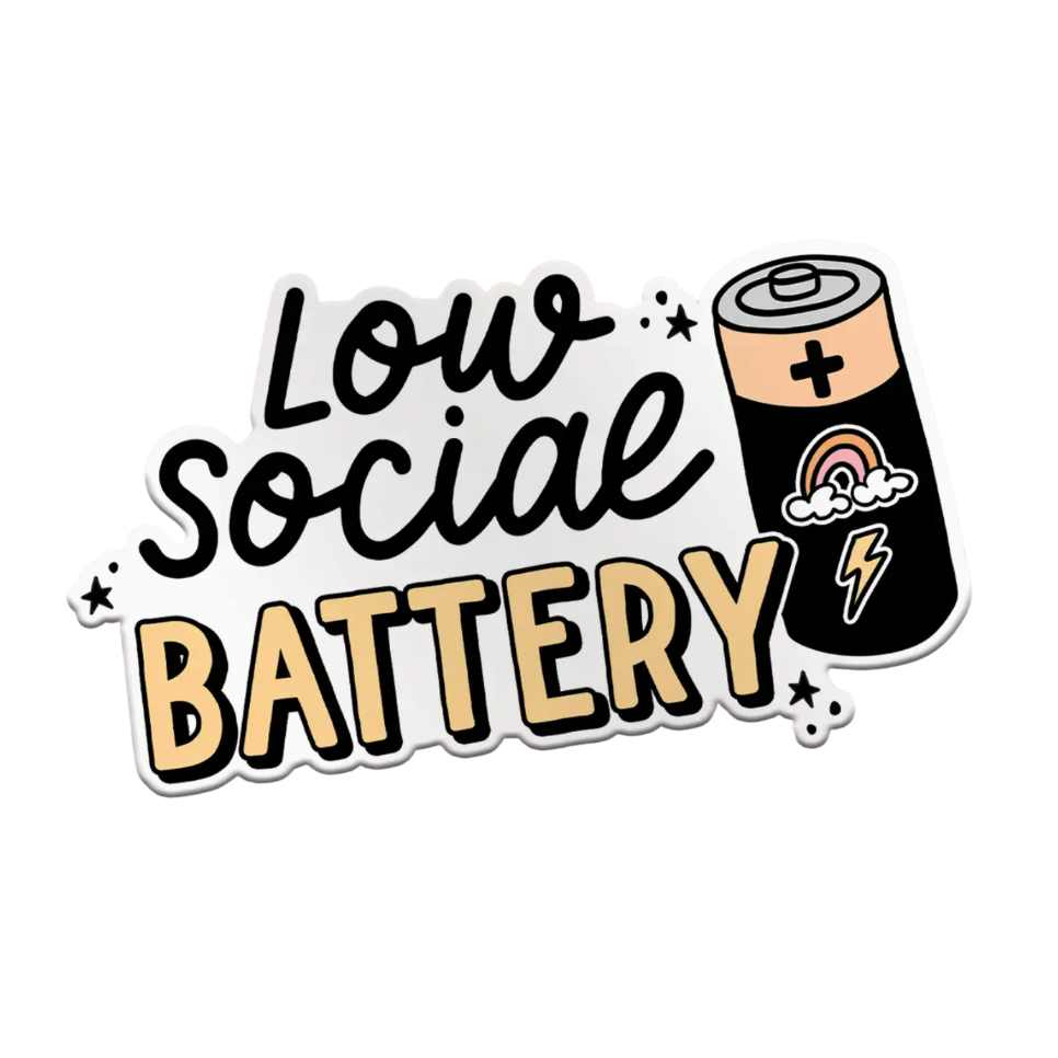 A die-cut sticker with the text 'Low social BATTERY' in black and beige lettering, accompanied by a cartoon battery illustration on a white background.