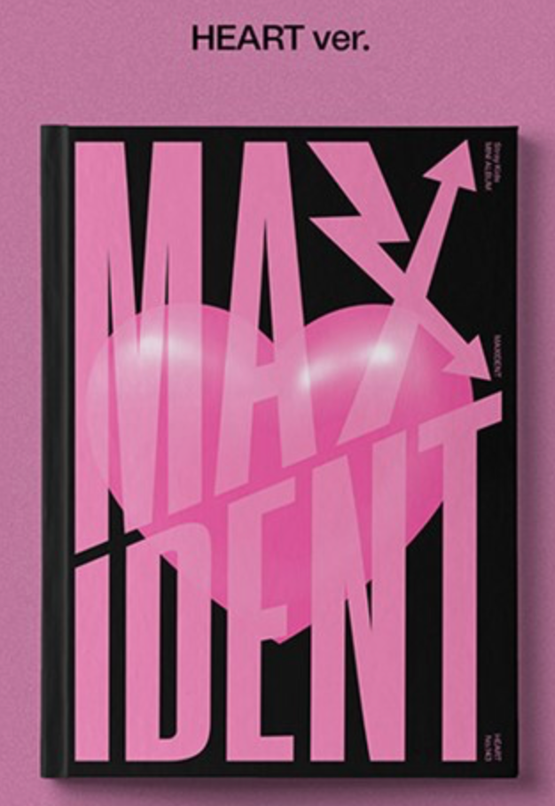 The image shows the cover of the STRAY KIDS mini album 'MAXIDENT'. The cover features a pink background with a heart and the album title in large pink letters.