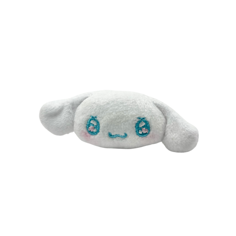 Plush cloud-shaped toy with smiley face on a white background