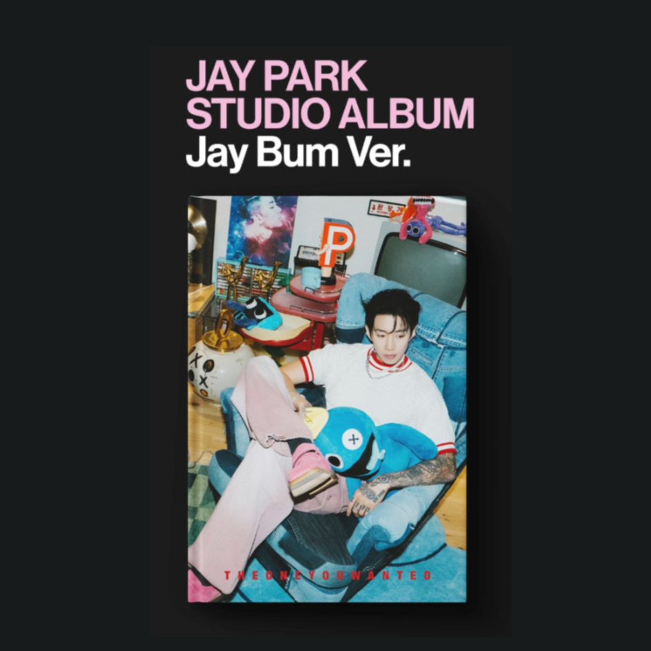 Album cover for Jay Park's 'Jay Bum Ver.' with a person sitting on a couch in a colorful room.