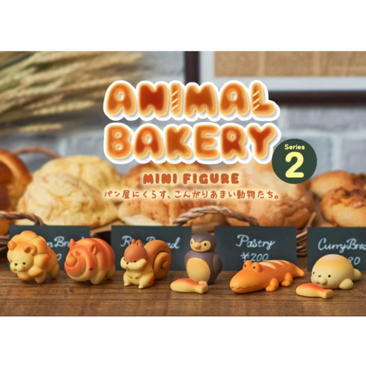 A collection of cute animal bakery minifigures from Series 2, including a crocodile, lion, croissant, seal, penguin, and squirrel, all designed to look like they are made of bread and have a Bakery theme.