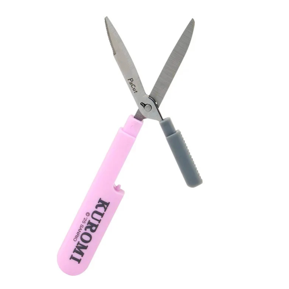Pink shears with gray and purple handles on a white background