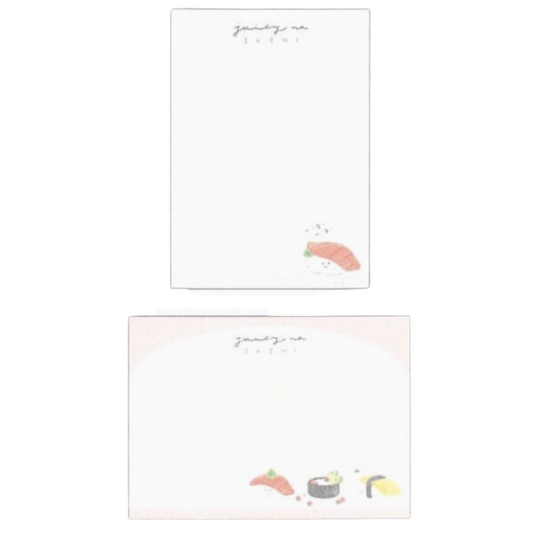 Memo pad with two different cartoon sushi design and text on a white background