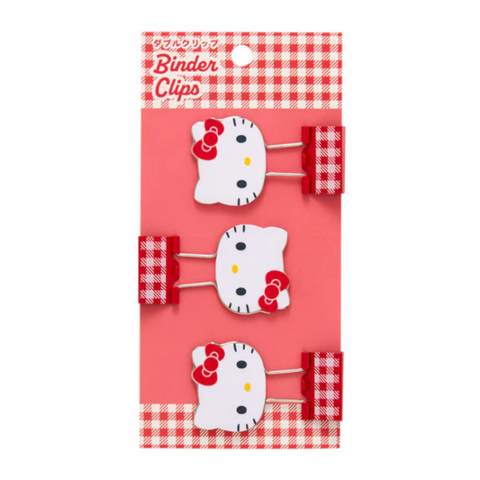 Set of three Hello Kitty-themed binder clips on a red and white checkered background