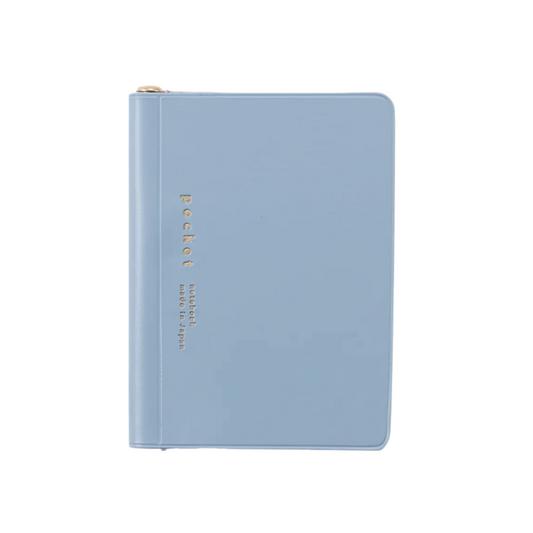 Light blue notebook with gold text on a white background