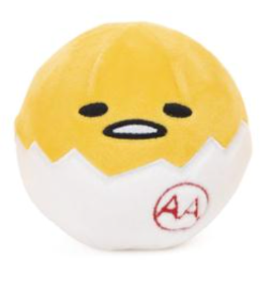 A plush egg character toy with a yellow top half, white bottom half, and a cracked eggshell design, featuring a simple black face and a red circular logo on the shell, shown on a plain white background.