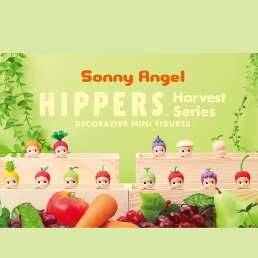 Sonny Angel Hippers Harvest Series decorative mini figures displayed in wooden crates with fruits and vegetables, on a light green background with product text.