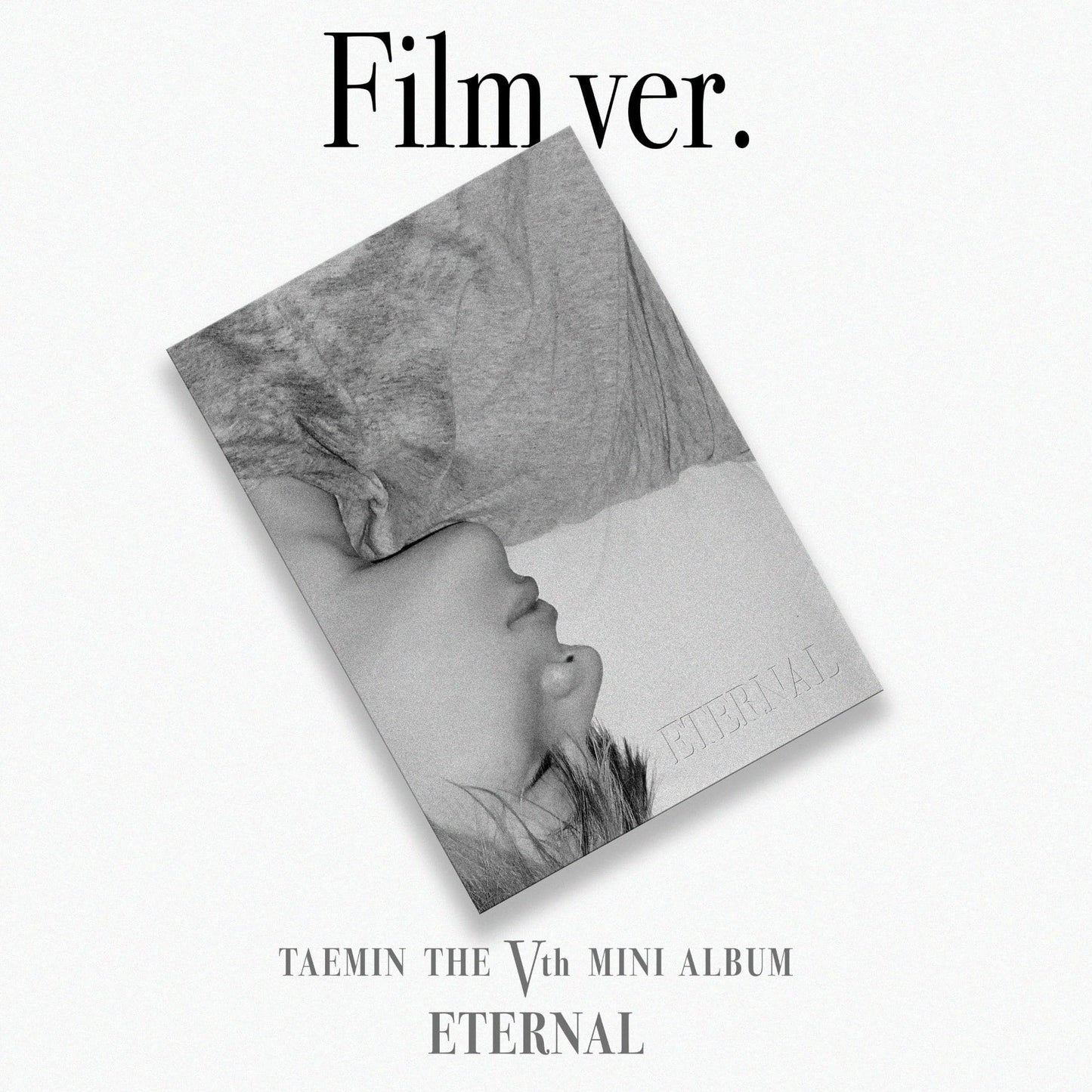 Album cover with a person's face and text 'Film ver.' and 'ETERNAL' on a white background