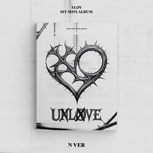 XLOV album cover with black heart design and text on a white background