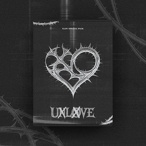 Black album packaging with a heart and cross design, featuring the brand 'UNLOVE'.