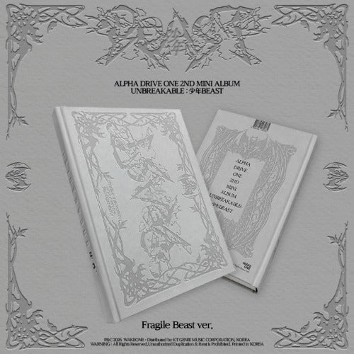 Alpha Drive One 2nd Mini Album 'Unbreakable: 7+Beast' Fragile Beast ver. shown as a white illustrated book and matching box on a light gray background with ornate border graphics.