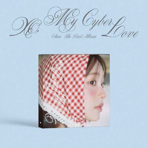 Album cover with a person wearing a red and white checkered headscarf on a light blue background