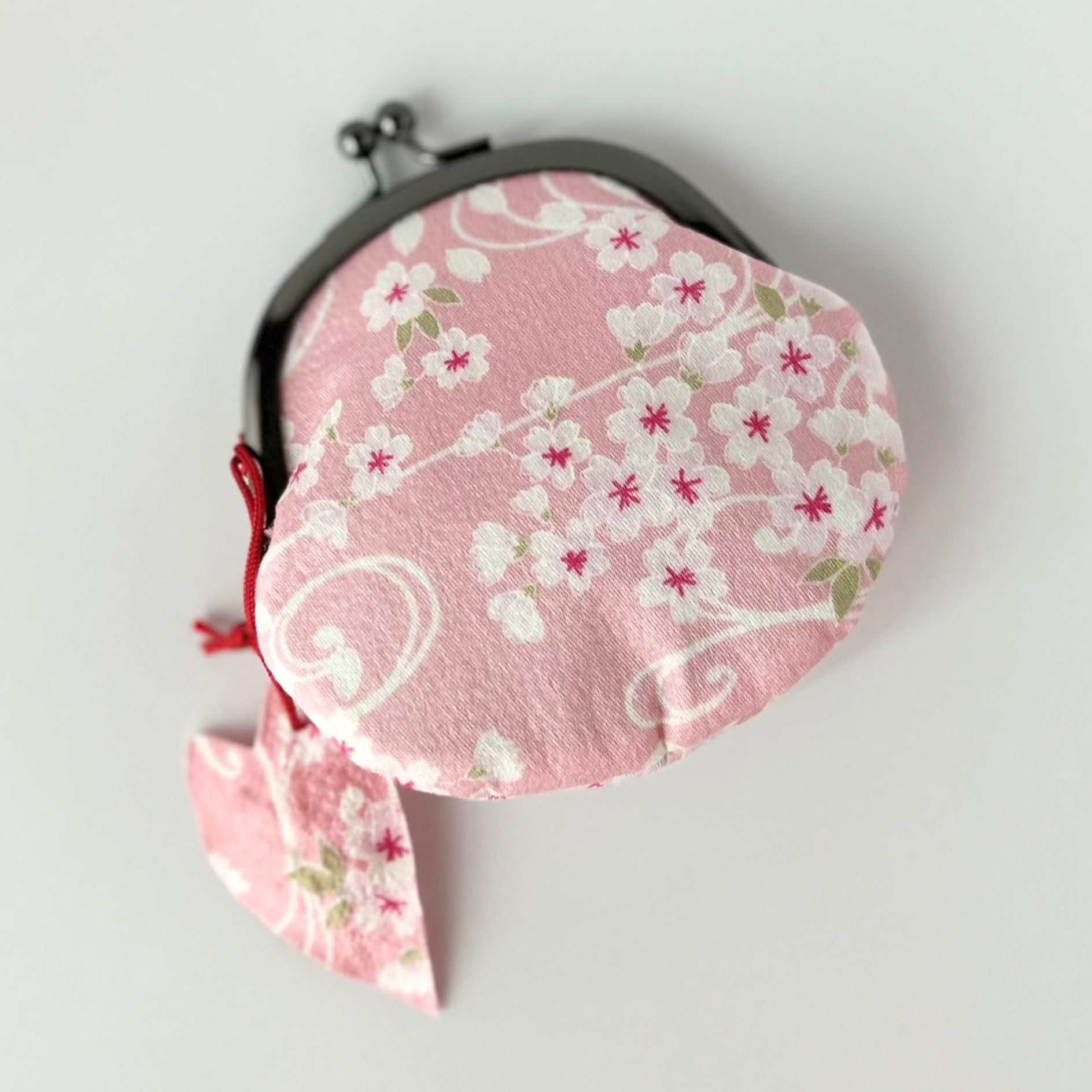 coin pouch shown in pink color