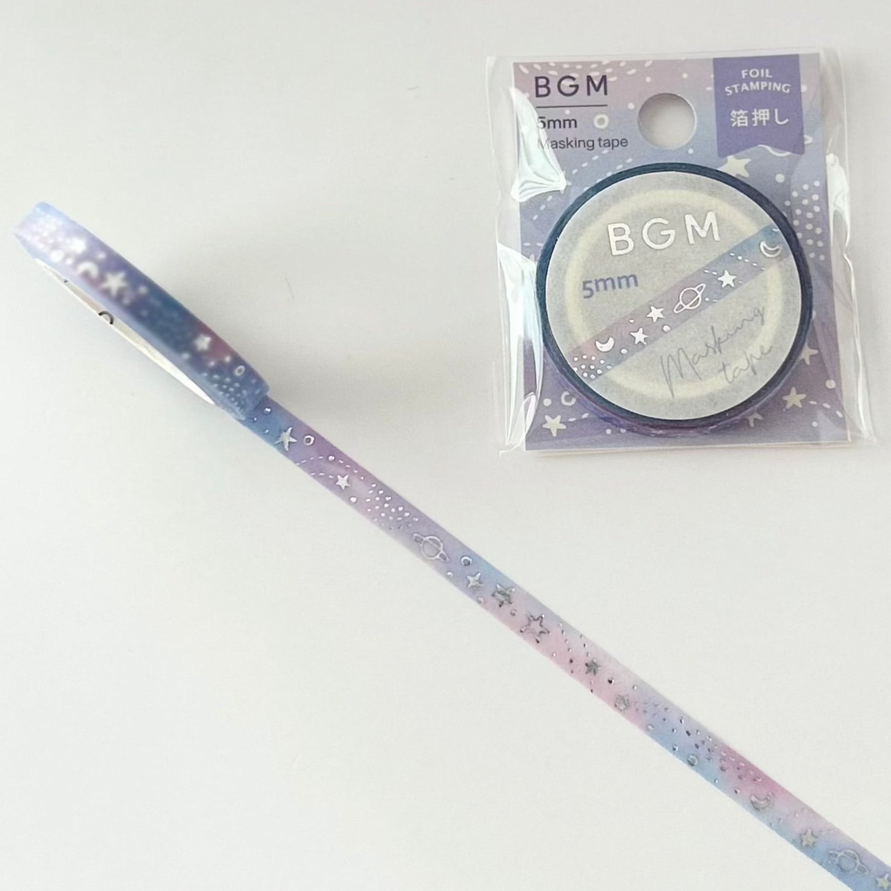 washi tape that has pink,  purple color, and silver accent with galaxy design