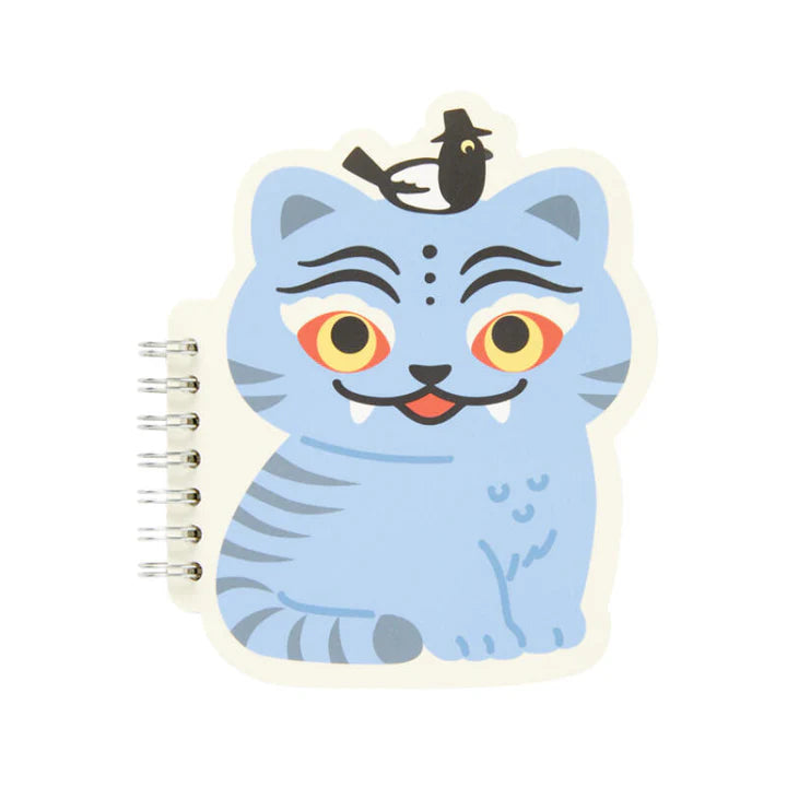 Notebook with a blue cat illustration on a white background