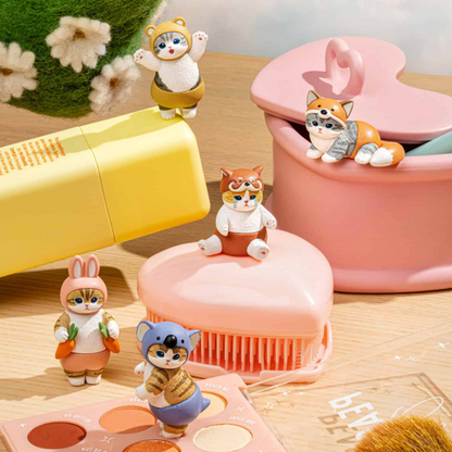 A collection of colorful blind box figurines, featuring cute cats in various outfits, displayed against a wooden background.