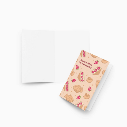 Greeting card with dessert-themed design on a white background