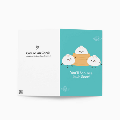 Teal greeting card with cartoon buns and text 'You'll Bao-nee Back Soon!' and branded with 'Cute Asian Cards' on the back on a white background