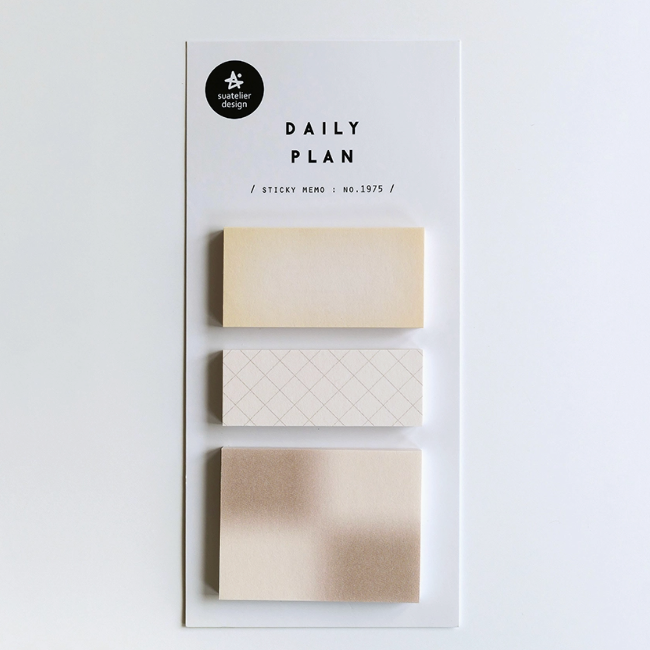 Set of beige sticky notes with 'Daily Plan' packaging on a white background