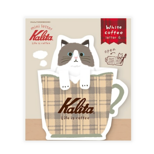 Letter set of a cat in a coffee cup with 'Kalita' branding on a beige background