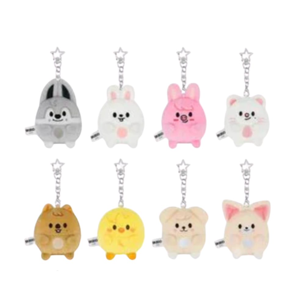 Set of cute animal plush keychains on a white background