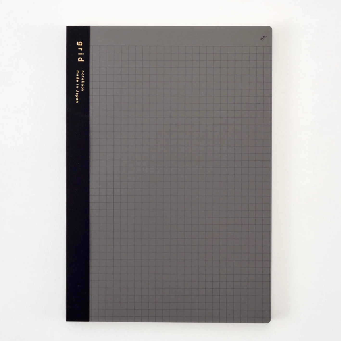 Gray notebook with grid pattern on a white background