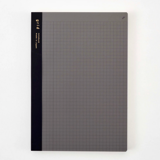 Gray notebook with grid pattern on a white background