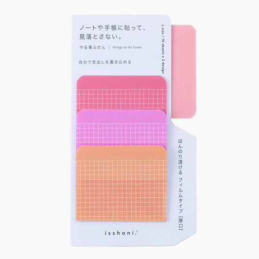 Set of colorful grid-patterned sticky notes with packaging on a white background