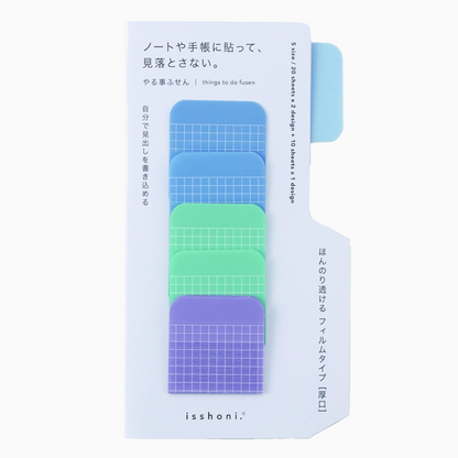 Packaging of colorful sticky notes with grid patterns on a white background