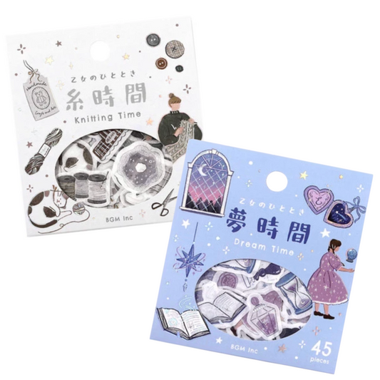 Two packages of decorative stickers with illustrations and text on a white background