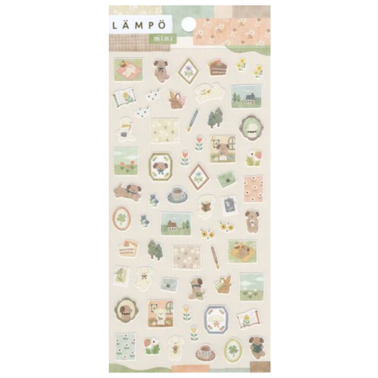 Sheet of decorative stickers with various illustrations on a white background, branded 'Lämpö'.