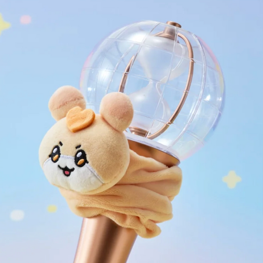 Plush ice cream toy with a bear face on a light blue background