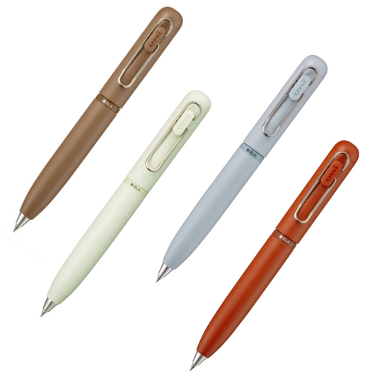 Four pens in different colors on a white background