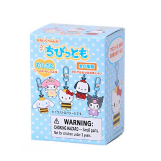 Box with Sanrio characters keychains design with a blue polka dot design on a white background