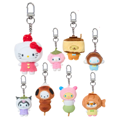 Set of cute Sanrio plush keychains on a white background