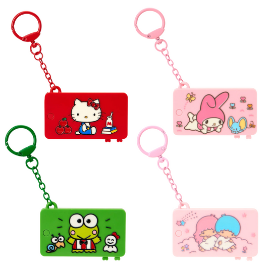 Four cartoon character keychains on a white background